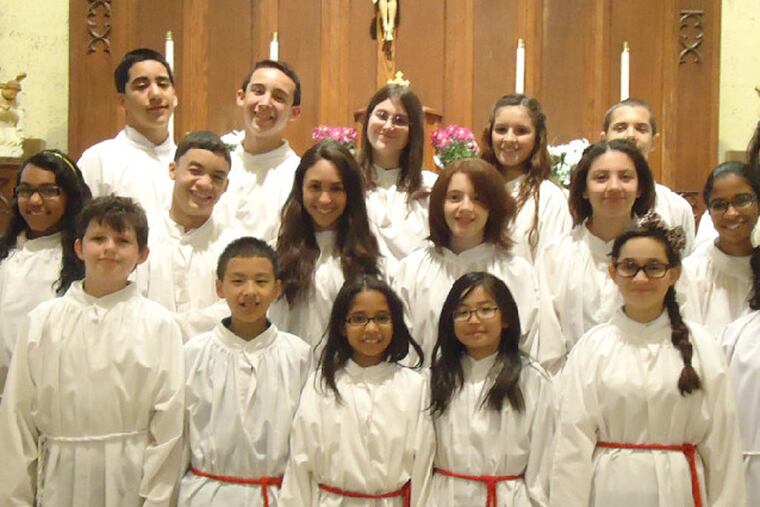 Altar servers at Holy Innocents parish in Juniata Park.