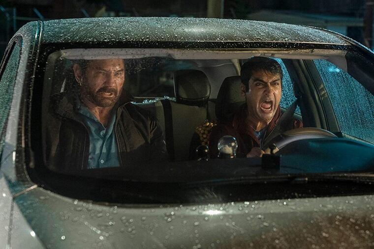 Dave Bautista and .Kumail Nanjiani in "Stuber." (Twentieth Century Fox/TNS)