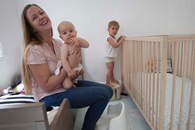 Eilish Volta and son Thor, 7 months at their home in the Norris Square section of Philadelphia on Friday, July 19, 2013. For story on Elimination Communication. The other son is Milo Volta, 2 1/2. ( ALEJANDRO A. ALVAREZ / STAFF PHOTOGRAPHER )
