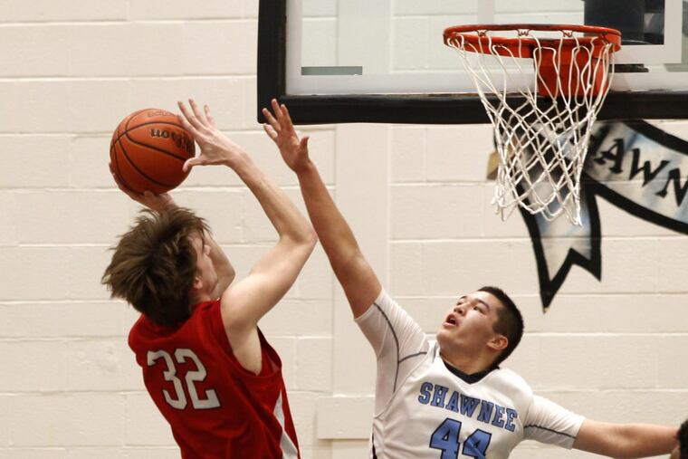 File photo: Lenape’s Andrew Sims (32) shoots in a win over Shawnee last season.