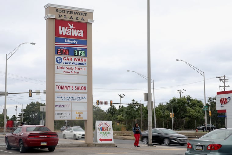 A vacant lot (rear) that developer Bart Blatstein hopes to turn into a Wawa gas station is pictured at South Christopher Columbus Boulevard and Tasker Street in South Philadelphia on Friday, Sept. 13, 2019.
