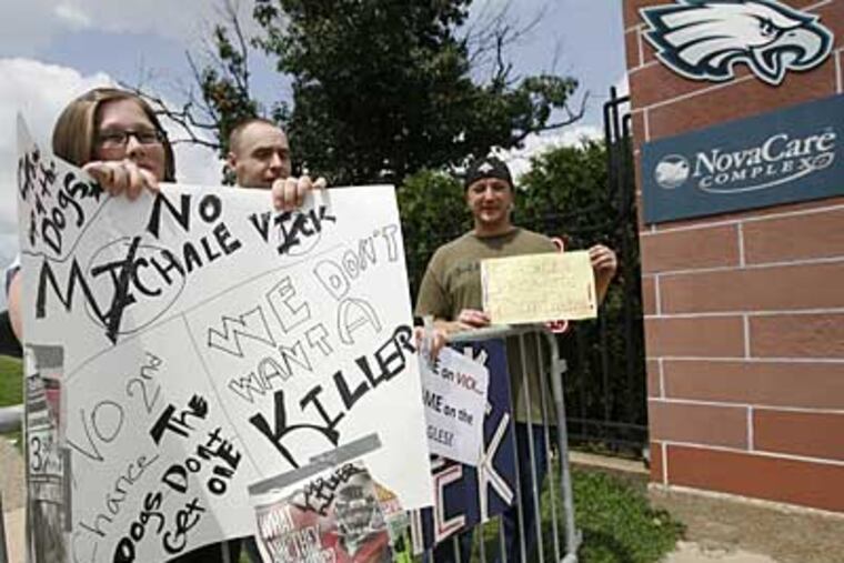 Protesters against the signing of Michael Vick by the Philadelphia Eagles gather at the entrance to the NovaCare Complex in south Philadelphia, Friday. (Alejandro A. Alvarez/Staff Photographer)