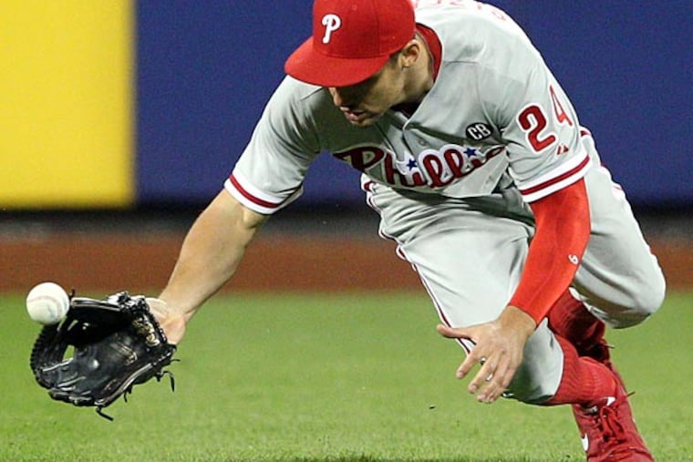 Philadelphia Phillies left fielder Grady Sizemore (24) drops a pop-fly hit by New York Mets center fielder Juan Lagares (not pictured) allowing two runs to score during the seventh inning of a game at Citi Field. (Brad Penner/USA Today