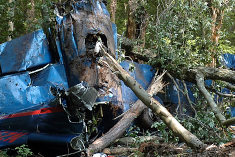 The wreckage of the 1972 military-style L-29 Czech plane that crashed near the Millville Airport. (Cody Glenn/AP/The Daily Journal)