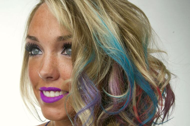 Tresses with sand-art tones are this summer's go-to fashion trend. (CLEM MURRAY / Staff Photographer)