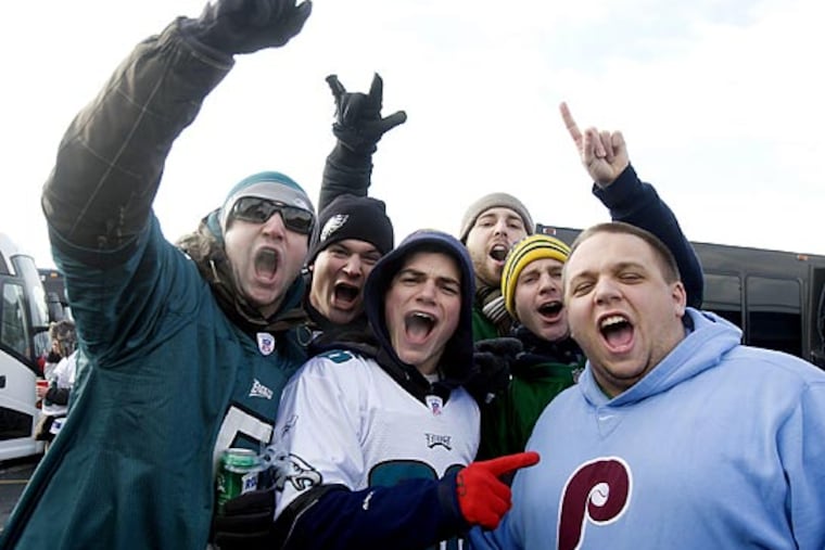 Eagles fans tailgating outside Giants Stadium pose for a photo. From left to right: Dan Hirsch, of Phoenixville, Kevin Ecker, of Cinnaminson, Rick Spadaro, of Paoli, Sean Riley, of Ridley Park, Steve Welsh, of Cinniminson, and Zach Geouque, of Collegeville. (Ed Hille/Staff Photographer)