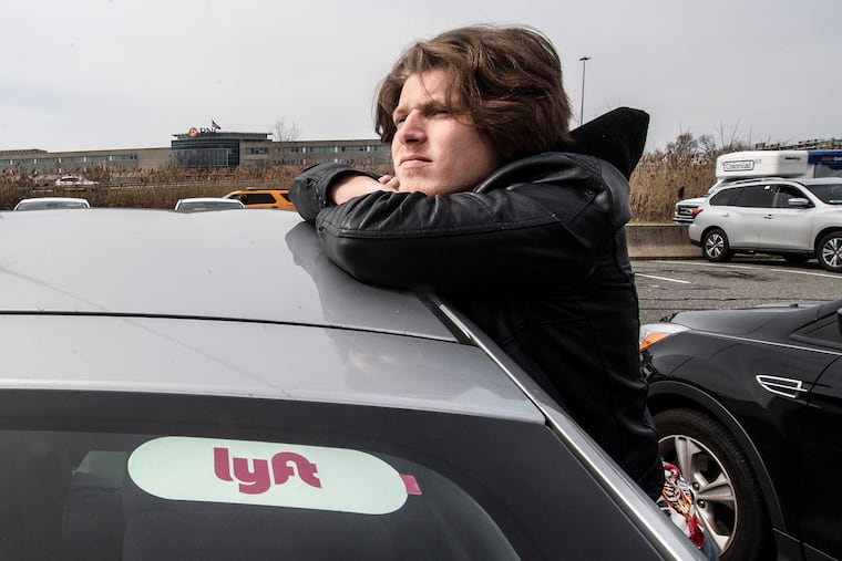 Vincenzo Spallino, local Lyft driver, waiting for customers on March 18.
