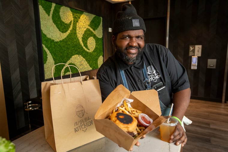 Reuben "Big Rube" Harley with his candied bacon burger and mint lemonade.
