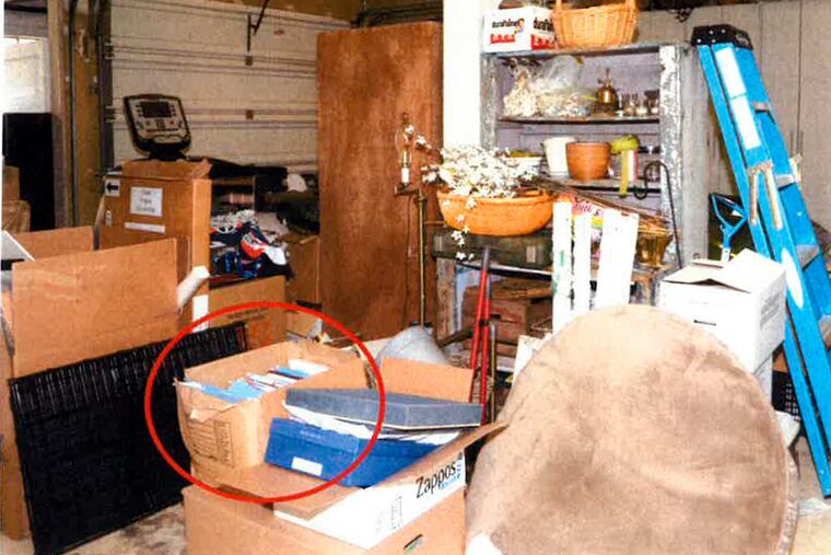 This image, contained in the report from special counsel Robert Hur, shows the box where classified Afghanistan documents were found in the garage of President Joe Biden in Wilmington, Del., during a search by the FBI on Dec. 21, 2022.