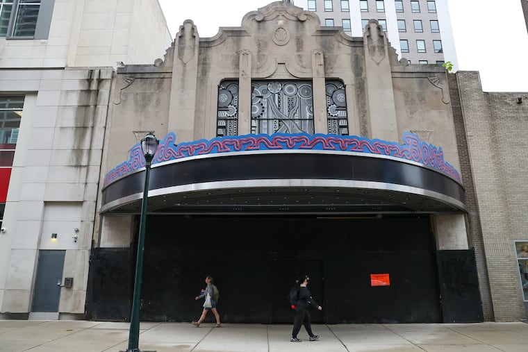 Pedestrians walk past the Boyd Theater on Chestnut Street near 19th in Philadelphia on Thursday, Sept. 9, 2021.