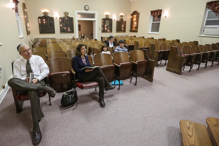 Eight members of the Temple Sons of Israel synagogue in DuBois, Pa., get ready for service on Friday, Nov. 8.