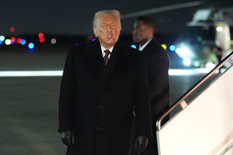 President Donald Trump arrives at Joint Base Andrews, Md., on Thursday after attending the World Economic Forum in Davos, Switzerland.