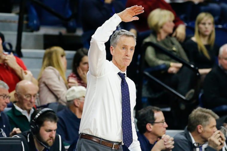 Penn coach Steve Donahue signaling to his players during a game Friday vs. Dartmouth.