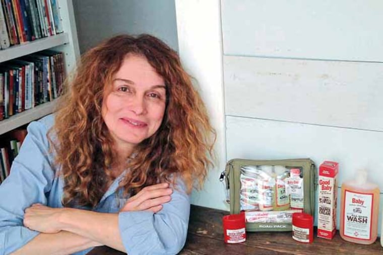 Philly native actress/director and now entrepreneur Melanie Mayron in her Hollywood home with her Mayron's Goods line of personal care products, which her chemist father David Mayron formulates in his lab in Hatfield. Staff photo by Diane Mastrull.