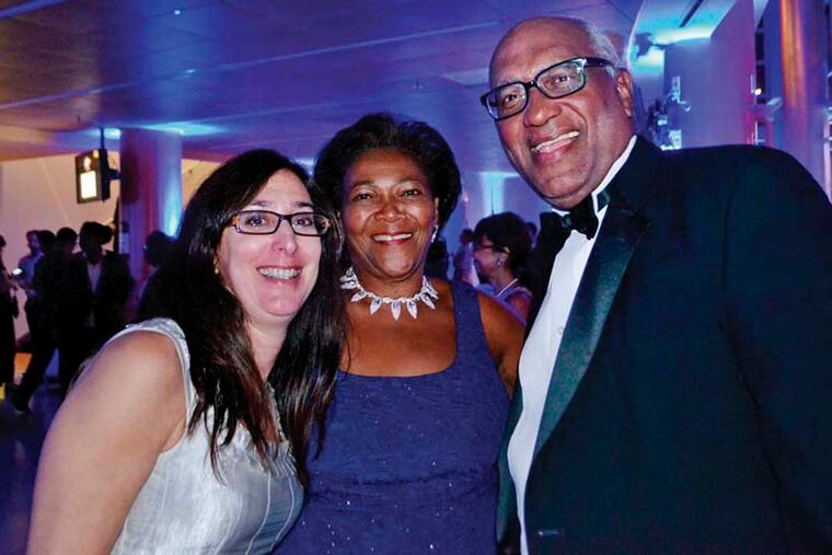 (From left) Eve Markman, Lynette Brown-Sow and Randall Sims at "An Evening of Art & Soul" the black tie optional gala held on Oct. 2nd at the Community College of Philadelphia.
(For the Inquirer/Maggie Henry Corcoran)