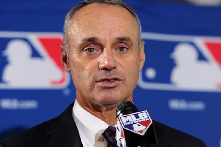 Newly elected commissioner of baseball Rob Manfred speaks at a press conference after being elected by team owners to be the next commissioner of Major League Baseball. (H.Darr Beiser/USA Today)