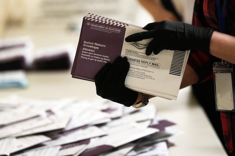 Department of Elections workers sort mail-in ballots for the California primary election at City Hall on Tuesday, June 2, 2026, in San Francisco.