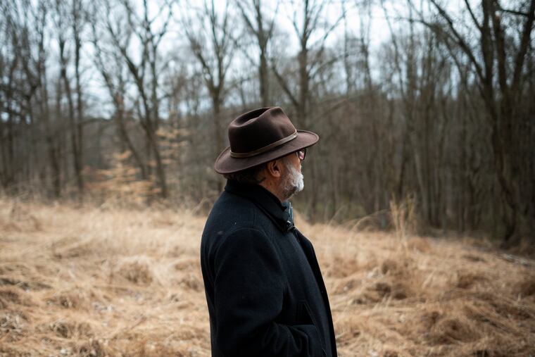 Mike Weilbacher, executive director of the Schuylkill Center for Environmental Education, walks along one of the trails there. He has a new book out.