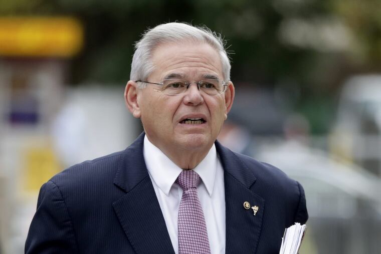 U.S. Sen. Bob Menendez arrives at the Martin Luther King, Jr., Federal Courthouse for his federal corruption trial, Thursday, Oct. 26, 2017, in Newark, N.J. (AP Photo/Julio Cortez)