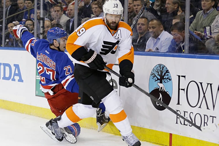 Scott Hartnell (19) looks to pass after checking New York Rangers' Ryan McDonagh (27) during the first period of Game 1 of an NHL hockey first-round playoff series on Thursday, April 17, 2014, in New York. (Frank Franklin II/AP)