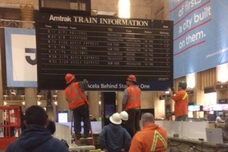 Work begins on dismantling the iconic flipboard at Amtrak's 30th Street Station.