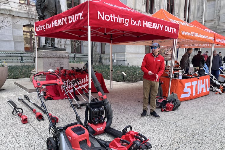 Andrew Rossi, a Milwaukee Tool territory manager, demonstrates the company's battery-powered alternatives to gas Tuesday at City Hall. He was there to support of a bill introduced in December by Councilmember Curtis Jones Jr. that would ban the use of gas-powered leaf blowers in the city. Stihl also demonstrated its equipment.