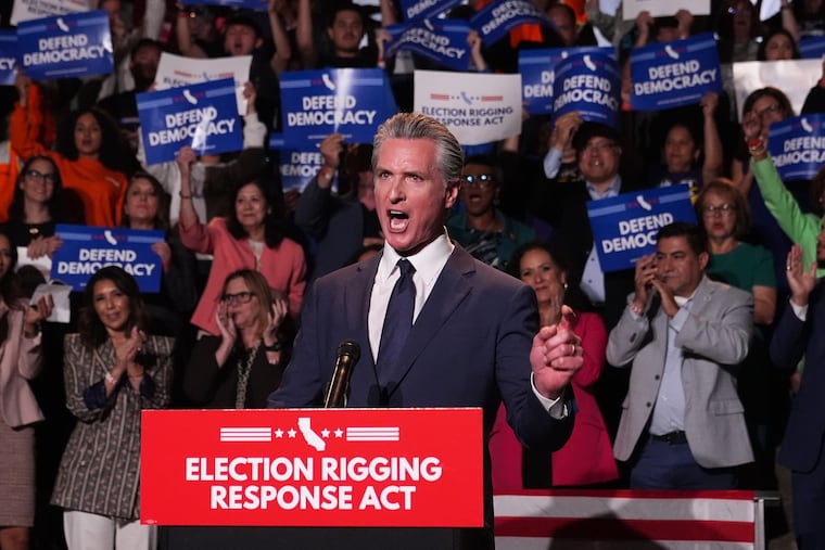 California Gov. Gavin Newsom speaks during a news conference, Aug. 14, 2025, in Los Angeles. Newsom posted Monday on X that the Justice Department is investigating him and his wife.