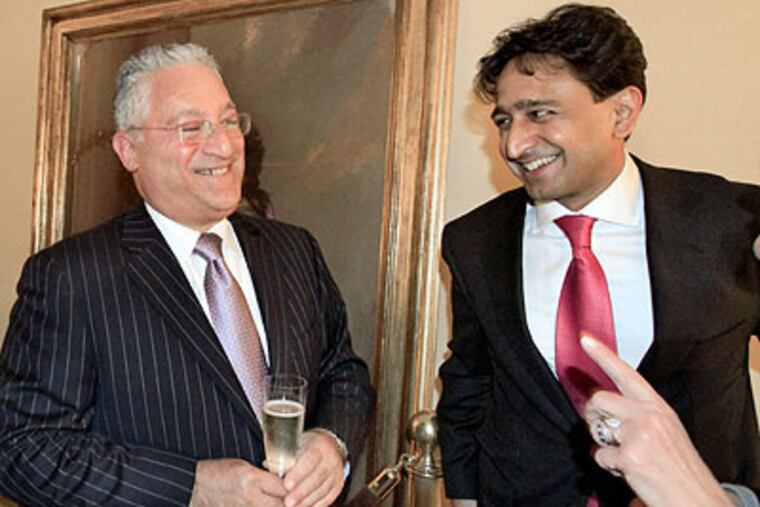 Rittenhouse Hotel general manager David Benton (left) and Neil Shah, brother of Jay Shah, at the dedication of a special suite. (Elizabeth Robertson / Staff Photographer)