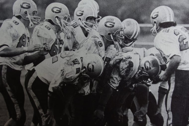 The Gloucester defense huddles in 1970. Marty Rafferty is No. 22 on the far right.