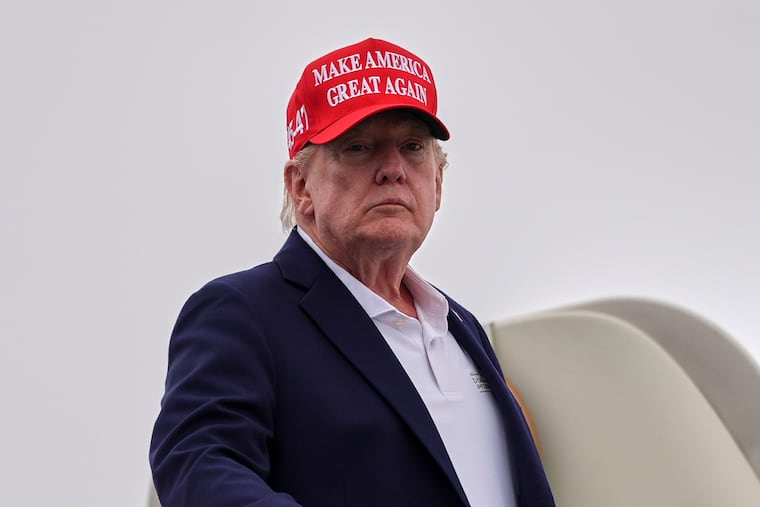 President Donald Trump boards Air Force One in Morristown, N.J., on Sunday, Aug. 16.