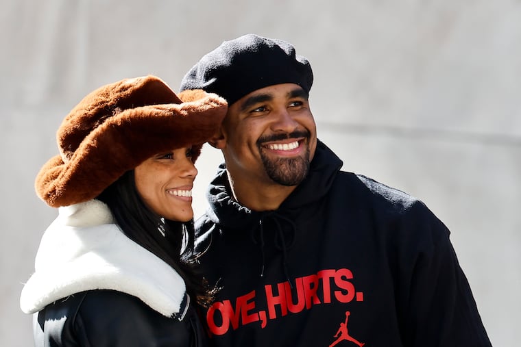 Jalen Hurts, at the Super Bowl victory parade with his fiancée, Bry Burrows, is a married man.