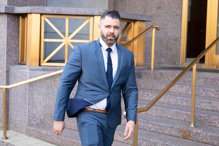 Mark D’Amico exits the U.S. Courthouse in Camden, N.J., on Thursday after his arraignment on a new set of federal fraud and money laundering charges.