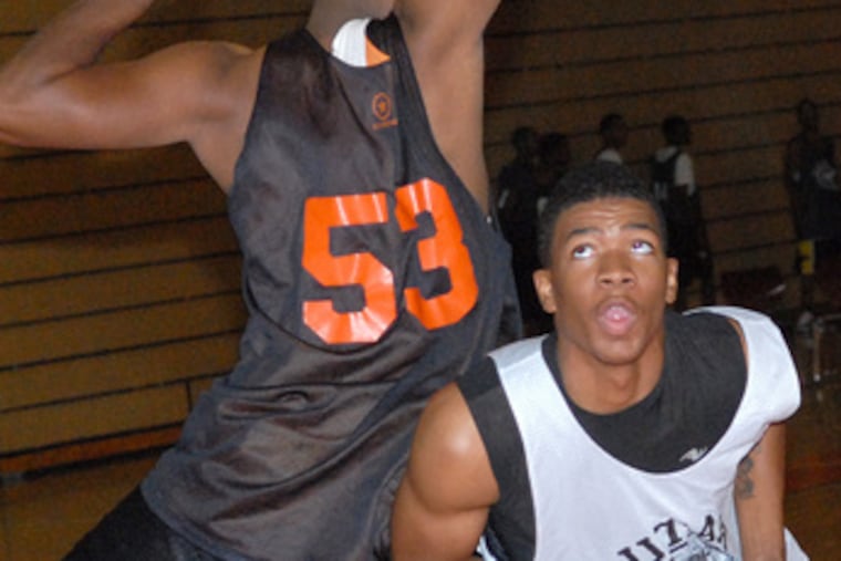 Keyon Staples (right) works against Chester teammate Learon Pray in practice. Chester was 33-1 last season.