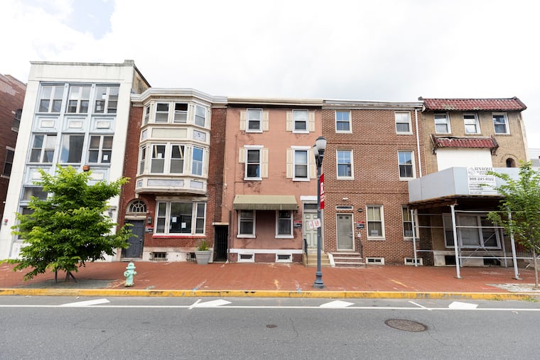 The facades of these buildings on the north side of Cooper Street between Fourth and Fifth streets in downtown Camden will be preserved and incorporated into a new structure as part of Rutgers University's Cooper Gateway project.