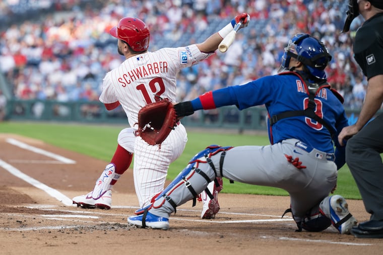 Kyle Schwarber hit his first of two home runs against the Chicago Cubs during the first inning on Monday.