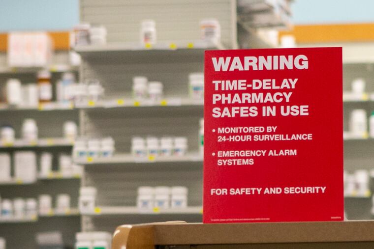 A sign advertising new safe technology for controlled substances sits on the counter at CVS pharmacy at 19th and Market streets on Tuesday, July 23, 2019. The press conference announced that all CVS pharmacies in Pennsylvania will now use safe technology for controlled substances to help reduce robberies. They also announced a $20,000 grant to Drexel University College of Medicine to support an opioid overdose reversal and prevention program.