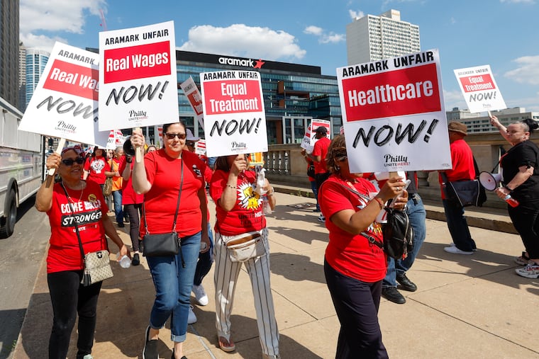 Aramark food-service workers picket outside Aramark Global Headquarters in Philadelphia on June 12, 2024.