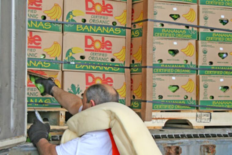 Bananas are checked for temperature as they leave Wilmington, the world's second-largest banana port. Dole Fresh Fruit Co.