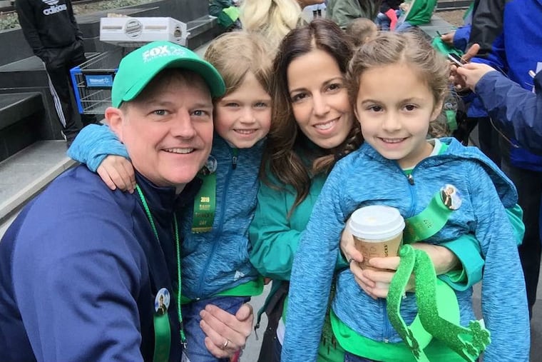 Chris O’Connell with his wife, Dawn, and their twin daughters, Eva and Sophia. The television reporter and anchor was sharing his health story during Stroke Awareness Month.