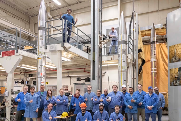 Three APEP rockets at NASA Wallops Flight Facility on Wallops Island, Va., last month along with NASA personnel.