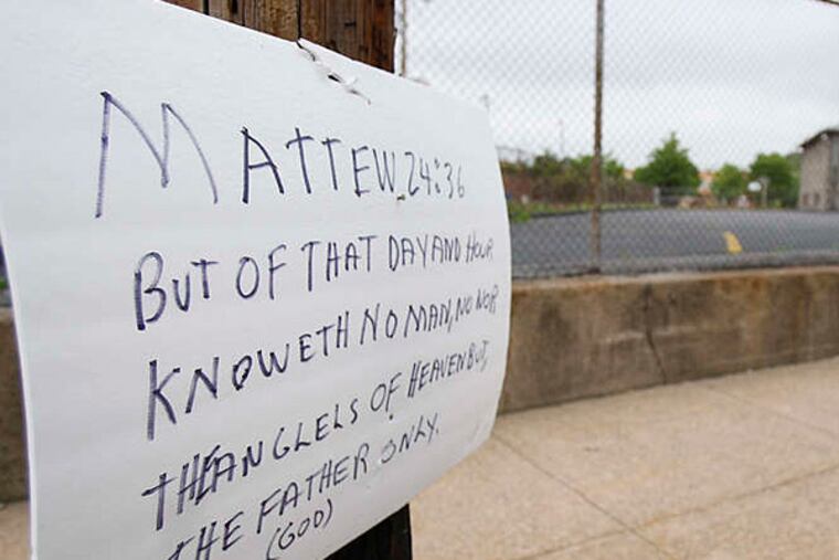 DAVID MAIALETTI / STAFF PHOTOGRAPHER A handmade sign, quoting a verse from the Gospel of Matthew, hangs near the Delaware County union hall used for eBible meetings.