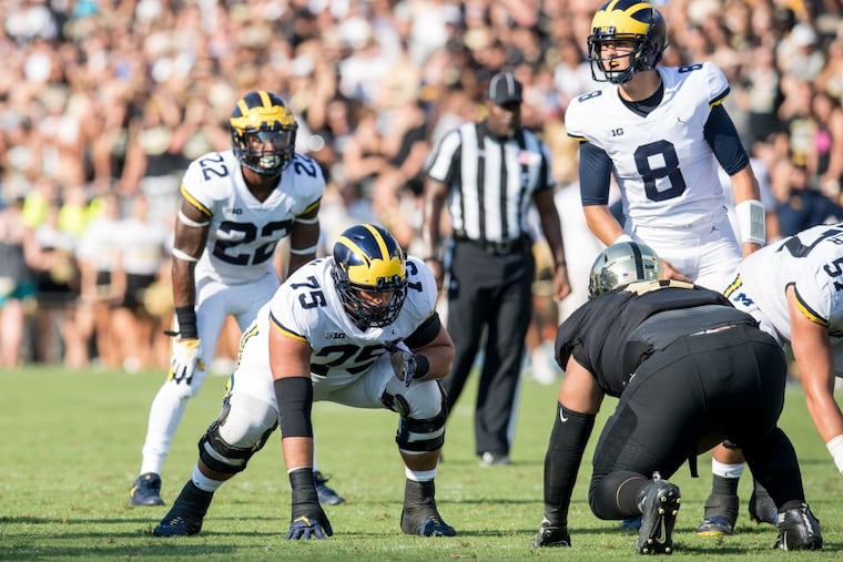 Michigan offensive lineman Jon Runyan (75)