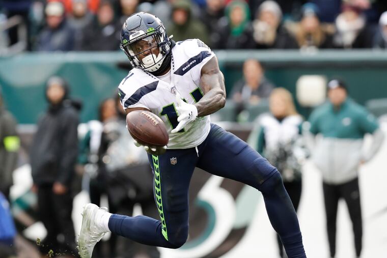 Seahawks wide receiver D.K. Metcalf attempts to catch the football against the Eagles in November.