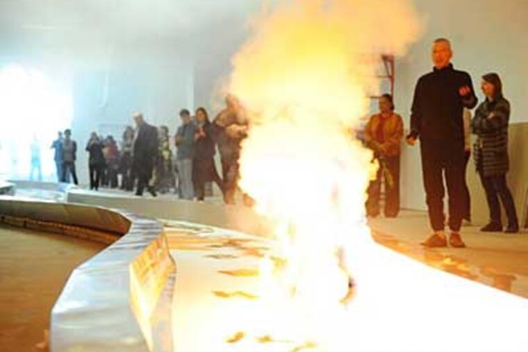 Fireworks artist Cai Guo-Qiang tests an event at the Fabric Workshop. (WILL BROWN)