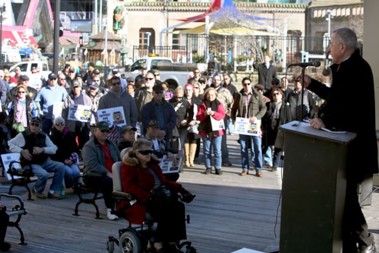 Retired doctor John Baker organized this Friday, Dec. 26, 2014, rally in support of police officers.