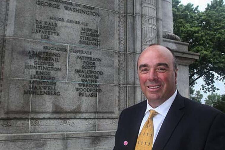 Mike Bowman, at Valley Forge National Historical Park, predicts that the pope's visit will boost the economy. (STEVEN M. FALK/Staff Photographer)