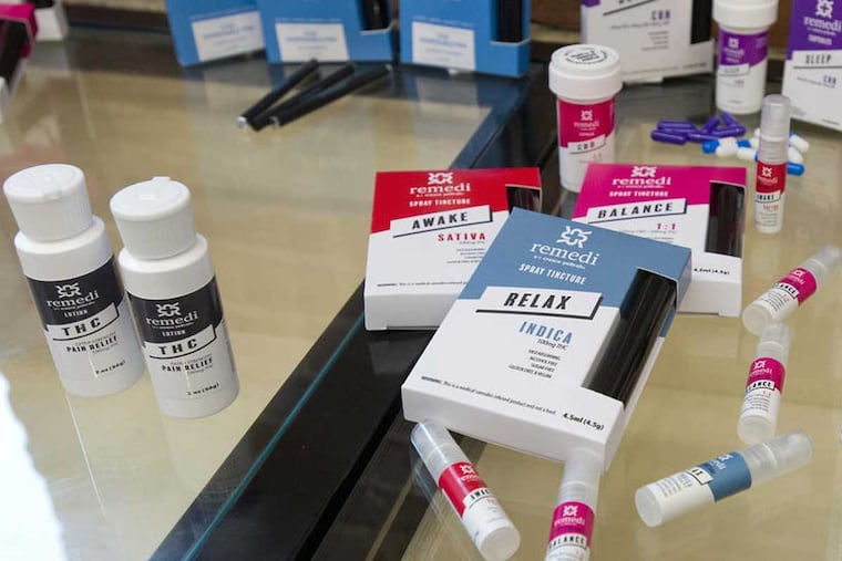 A variety of medical marijuana packaging materials are on display during a grand opening for Keystone Canna Remedies medical marijuana dispensary in Bethlehem. The dispensary is the first in the state to open.