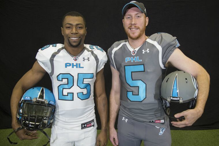 Safety James Romain (left) and quarterback Dan Raudabaugh had big games for the Soul against Columbus.