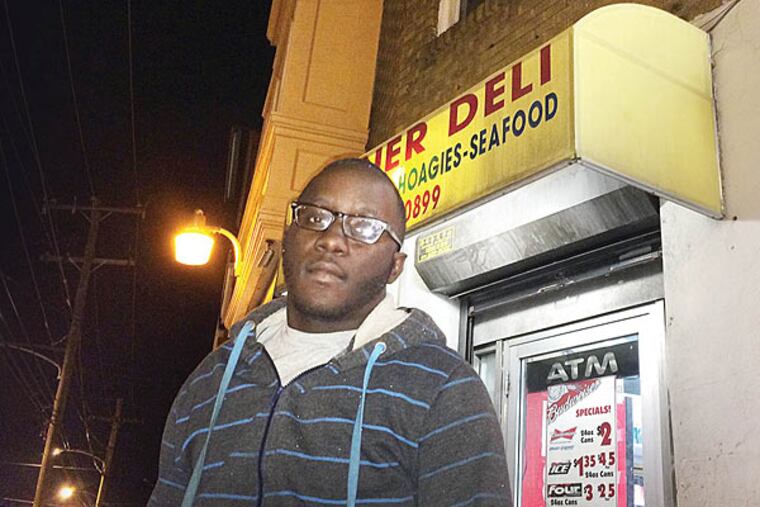 Eric Thomas says that although he's normally a 'cool-headed' guy, the fight came out of him when he saw his son sitting helpless in a stranger's car. (Vinny Vella/Staff)