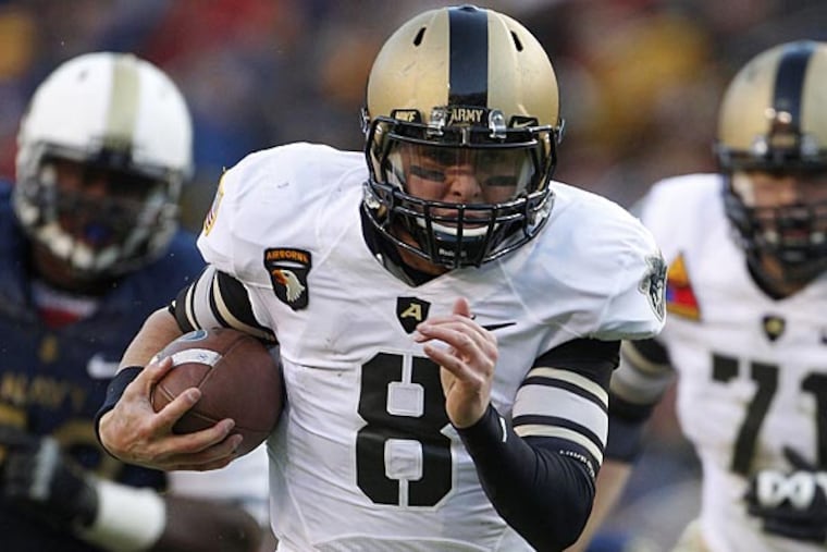 Army quarterback Trent Steelman (8) runs for a touchdown in the first
half of an NCAA college football game against Navy in Landover, Md.,
Saturday, Dec. 10, 2011. (AP Photo/Evan Vucci)